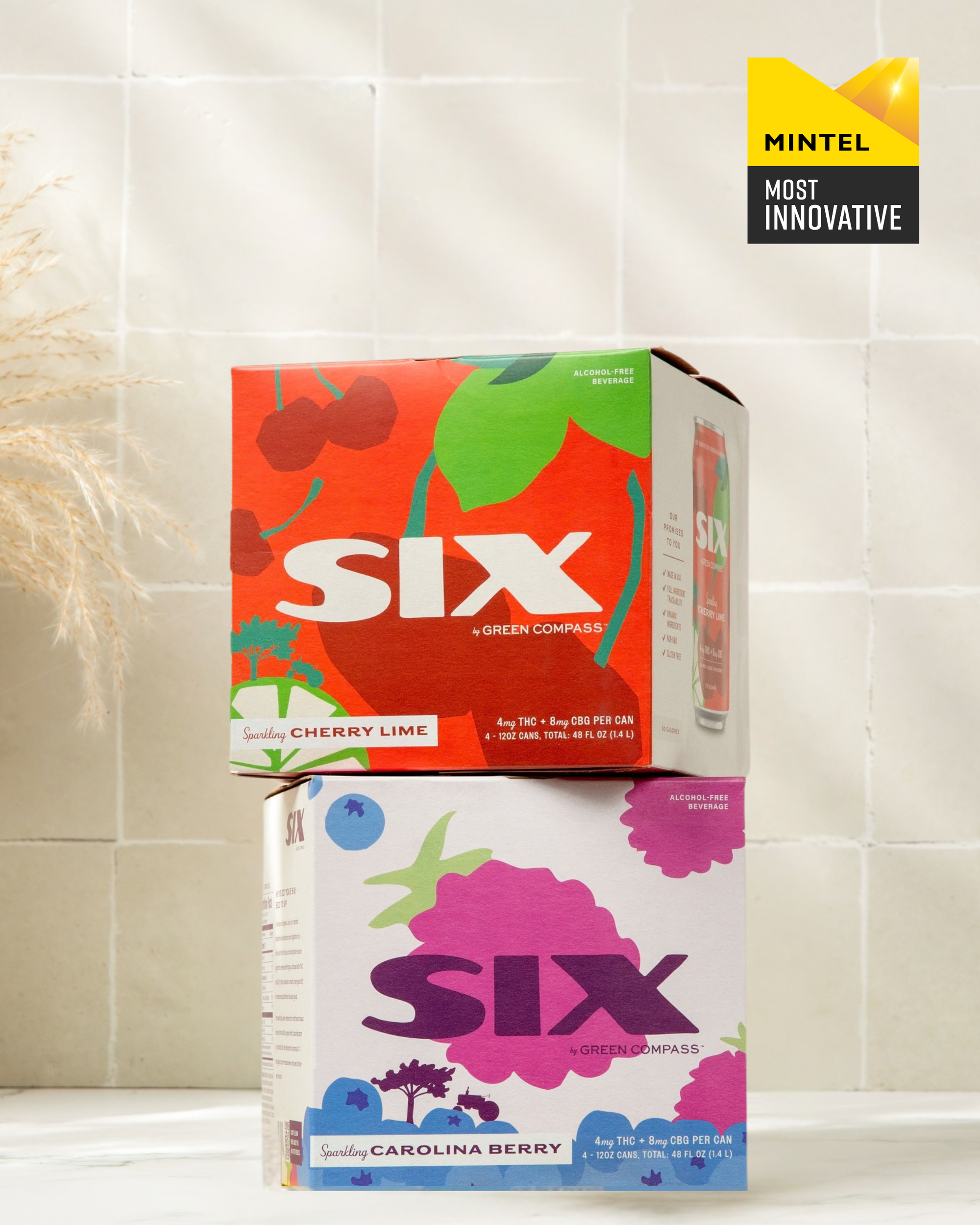 Two boxes of 'Six' drinks on a tiled surface with a badge in the top right corner that displays a mintel most innovative award